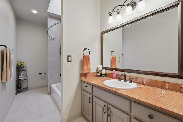 full bath with baseboards, tub / shower combination, recessed lighting, vanity, and tile patterned flooring