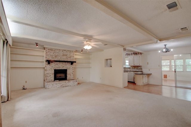 1001 S Sutton St, Mabank, TX 75147 - unfurnished living room with a textured ceiling, visible vents, light carpet, and beam ceiling