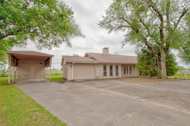 1001 S Sutton St, Mabank, TX 75147 - ranch-style house with brick siding, a chimney, a front yard, and aphalt driveway
