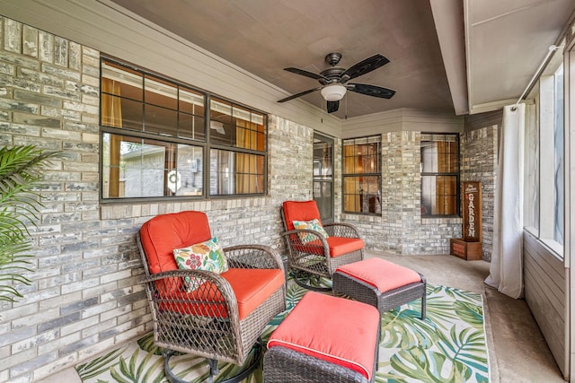 view of patio featuring ceiling fan and covered porch