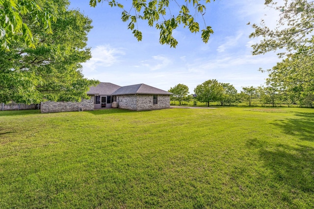 view of yard featuring fence