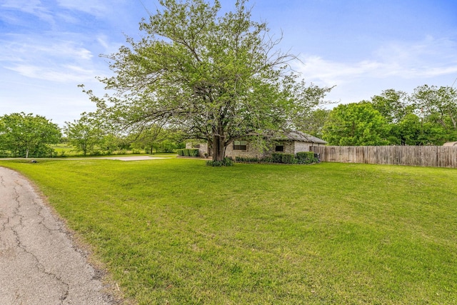 view of yard featuring fence