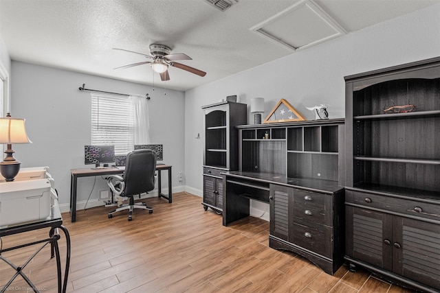 868 Briggs Blvd, East Tawakoni, TX 75472 - office space featuring attic access, light wood-style floors, baseboards, and a ceiling fan
