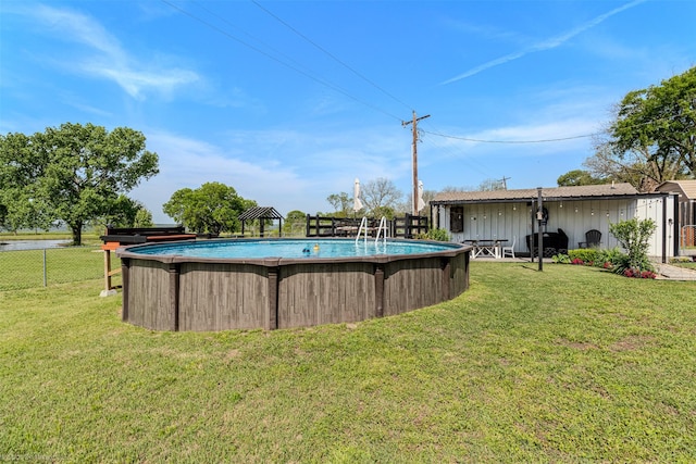 868 Briggs Blvd, East Tawakoni, TX 75472 - outdoor pool with a yard and fence