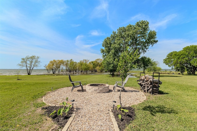 868 Briggs Blvd, East Tawakoni, TX 75472 - view of yard with an outdoor fire pit and a water view