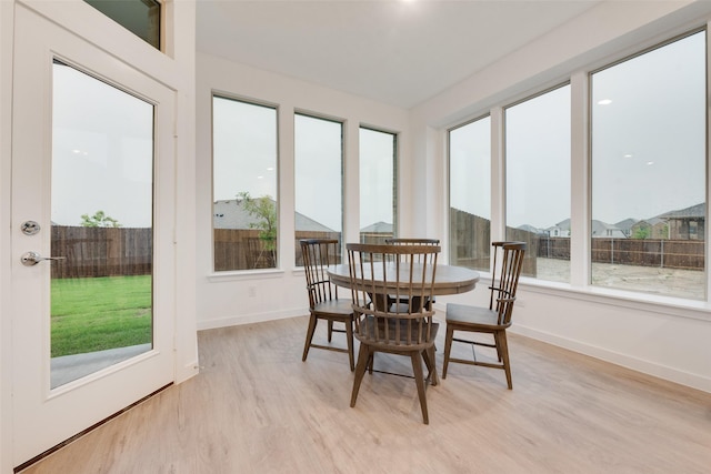 440 Lone Star Dr, Justin, TX 76247 - sunroom featuring baseboards, a healthy amount of sunlight, and wood finished floors
