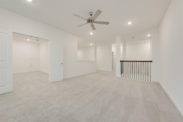 440 Lone Star Dr, Justin, TX 76247 - spare room featuring light colored carpet, baseboards, a ceiling fan, and recessed lighting