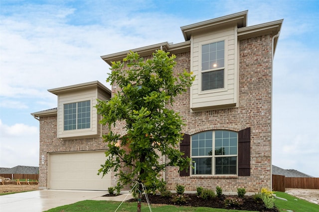 440 Lone Star Dr, Justin, TX 76247 - view of front of property with an attached garage, brick siding, driveway, and fence
