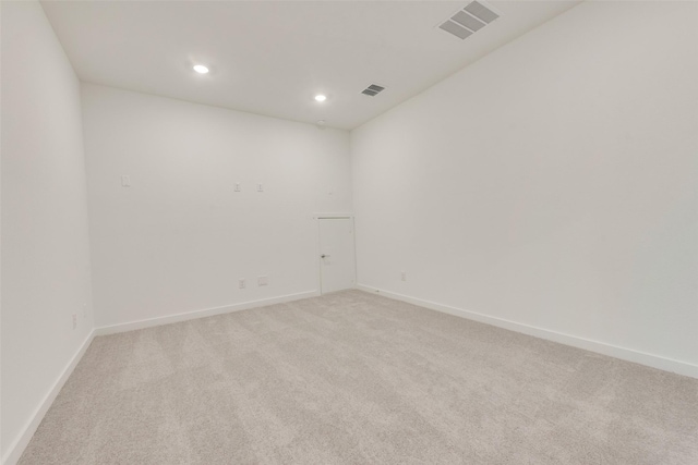 440 Lone Star Dr, Justin, TX 76247 - unfurnished room featuring baseboards, recessed lighting, visible vents, and light colored carpet