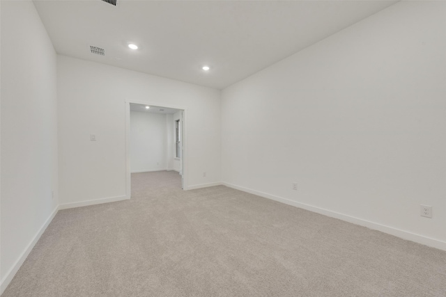 440 Lone Star Dr, Justin, TX 76247 - empty room featuring light colored carpet, baseboards, visible vents, and recessed lighting