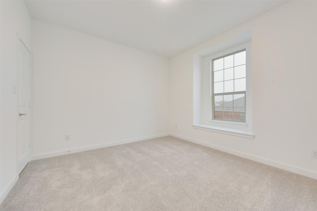 440 Lone Star Dr, Justin, TX 76247 - unfurnished room with light colored carpet and baseboards