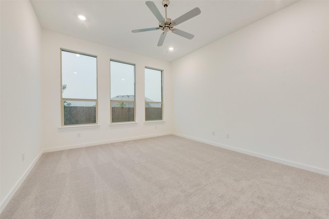 440 Lone Star Dr, Justin, TX 76247 - unfurnished room with light colored carpet, baseboards, a ceiling fan, and recessed lighting
