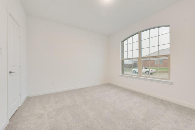 440 Lone Star Dr, Justin, TX 76247 - unfurnished room with light colored carpet and baseboards