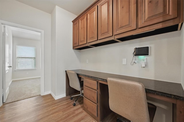 512 Hidden Springs Trl, Azle, TX 76020 - office featuring built in study area, light wood-style flooring, and baseboards
