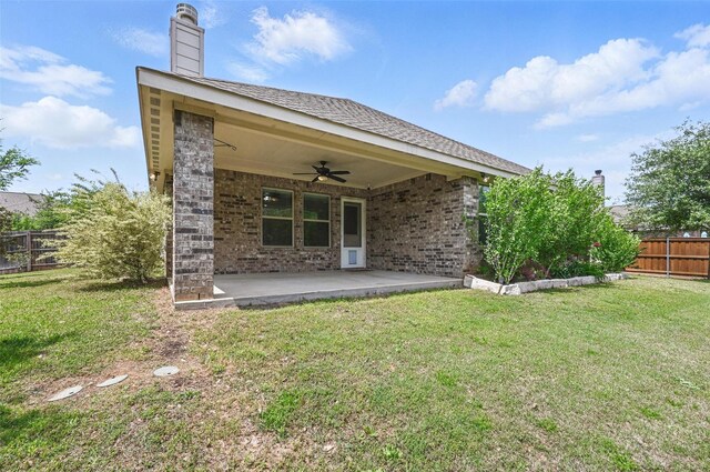 512 Hidden Springs Trl, Azle, TX 76020 - rear view of house with a ceiling fan, a patio area, brick siding, and a chimney