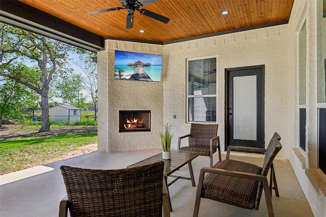 view of patio / terrace featuring a ceiling fan
