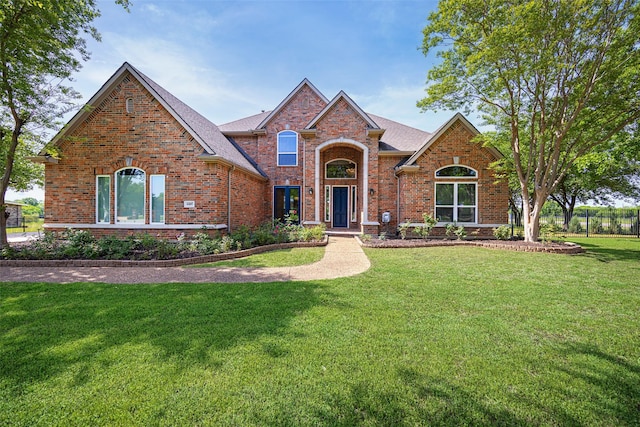 4209 Willow Ridge Dr, Parker, TX 75002 - view of front of house featuring brick siding, a front lawn, and roof with shingles
