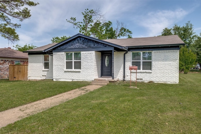 10061 Neosho Dr, Dallas, TX 75217 - ranch-style house featuring a front yard, fence, and brick siding