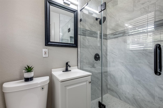 10061 Neosho Dr, Dallas, TX 75217 - bathroom featuring a shower stall, vanity, and toilet