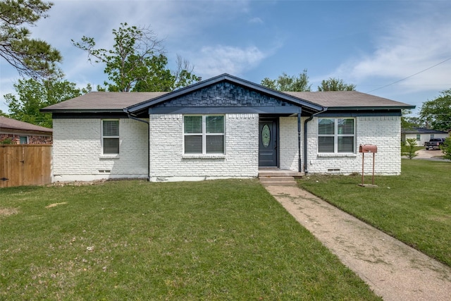 10061 Neosho Dr, Dallas, TX 75217 - single story home with roof with shingles, a front yard, fence, and brick siding