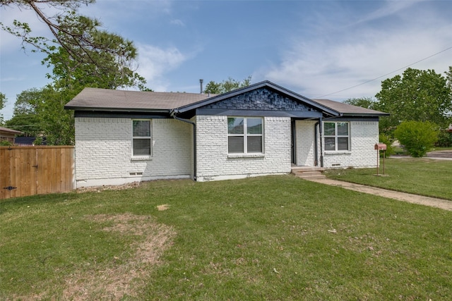 10061 Neosho Dr, Dallas, TX 75217 - ranch-style home featuring crawl space, fence, a front lawn, and brick siding
