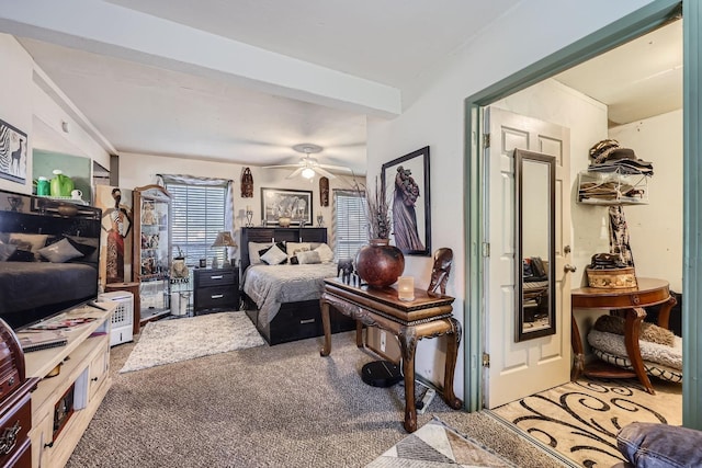 bedroom with ceiling fan and light carpet