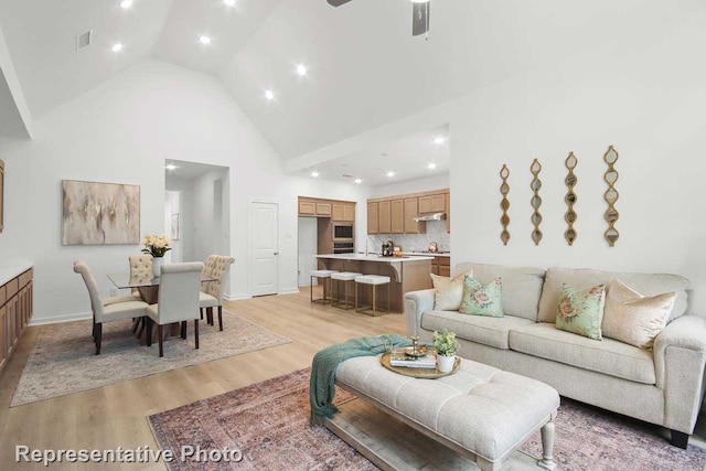 3146 Duck Heights Ave, Royse City, TX 75189 - living room featuring recessed lighting, light wood-style flooring, ceiling fan, visible vents, and high vaulted ceiling