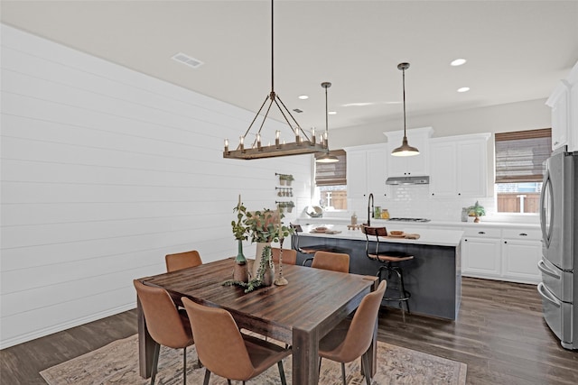 3341 Man O War Rd, Celina, TX 75009 - dining space featuring dark wood-type flooring and recessed lighting