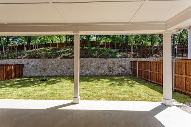 view of yard with a patio and a fenced backyard