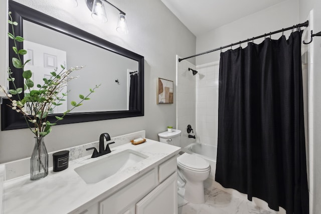 full bath featuring marble finish floor, shower / tub combo with curtain, toilet, and vanity