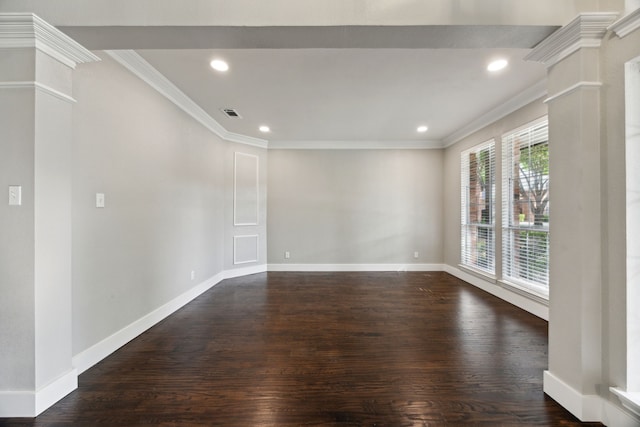 unfurnished room with dark wood-style floors, visible vents, baseboards, recessed lighting, and crown molding