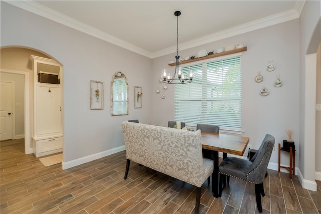 1153 Horizon Trace Dr, Azle, TX 76020 - dining room featuring baseboards, a chandelier, crown molding, and wood finished floors