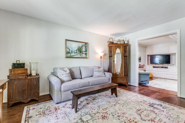 living room with wood finished floors