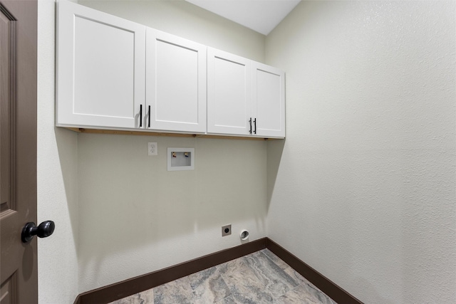 228 W Fm 27, Fairfield, TX 75840 - laundry area with cabinet space, hookup for an electric dryer, washer hookup, and baseboards