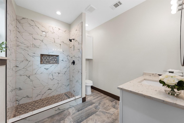 228 W Fm 27, Fairfield, TX 75840 - full bath featuring vanity, toilet, a marble finish shower, baseboards, and recessed lighting