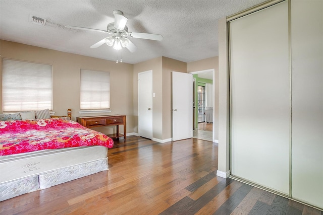 10125 Leatherwood Dr, Fort Worth, TX 76108 - bedroom featuring visible vents, multiple windows, and wood finished floors