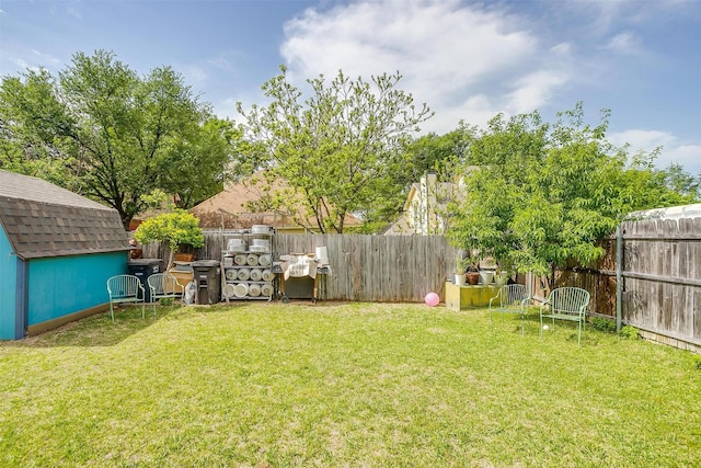 10125 Leatherwood Dr, Fort Worth, TX 76108 - view of yard featuring a storage shed, a fenced backyard, and an outdoor structure