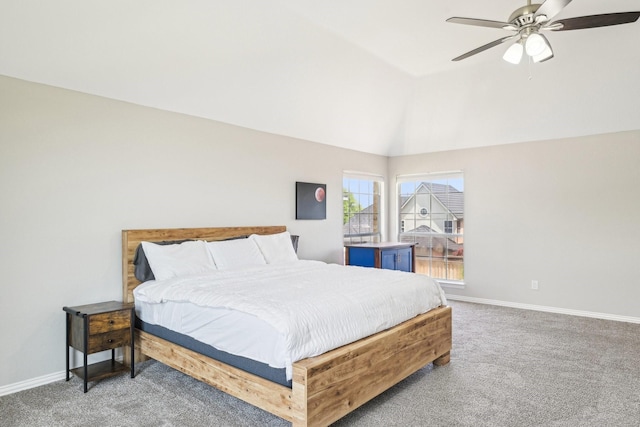 bedroom with baseboards, ceiling fan, lofted ceiling, and light colored carpet