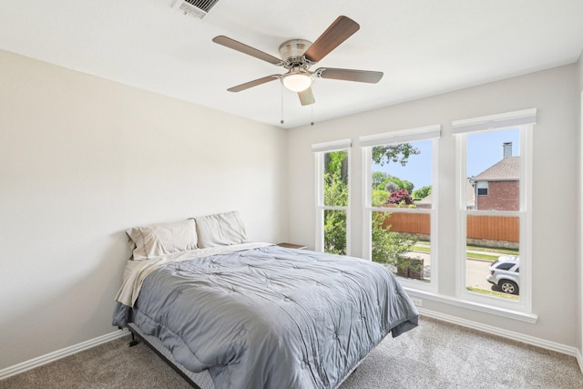 7812 Alderwood Pl, Plano, TX 75025 - carpeted bedroom with baseboards and ceiling fan