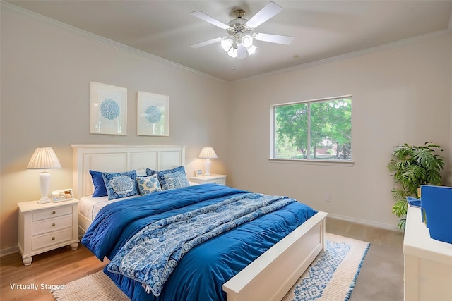 bedroom with ceiling fan, baseboards, and crown molding