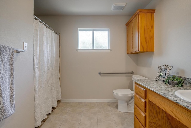 bathroom with curtained shower, tile patterned flooring, toilet, vanity, and baseboards