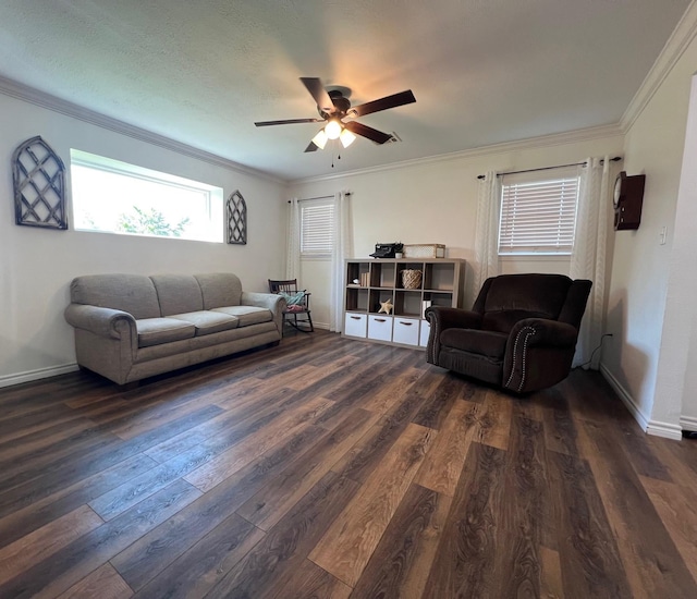 living area featuring a ceiling fan, crown molding, baseboards, and dark wood-style floors