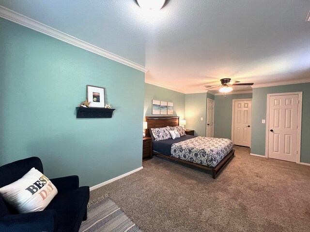 carpeted bedroom featuring crown molding, baseboards, and a ceiling fan