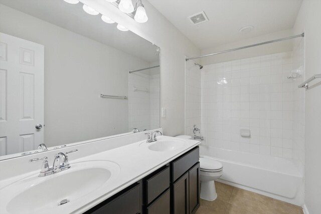1513 Toucan Dr, Little Elm, TX 75068 - full bath with vaulted ceiling, tile patterned floors, a bath, and double vanity