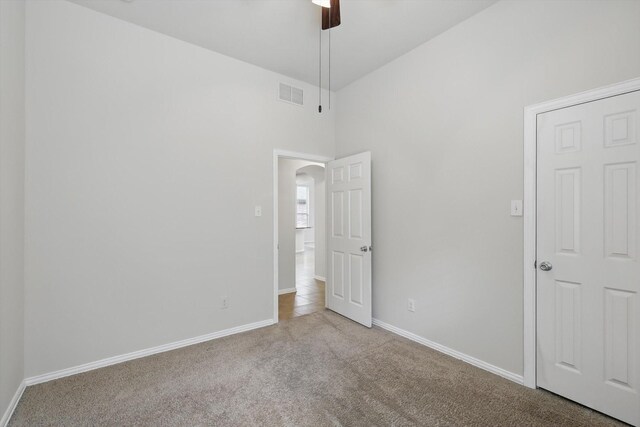 1513 Toucan Dr, Little Elm, TX 75068 - empty room with ceiling fan, carpet, and baseboards