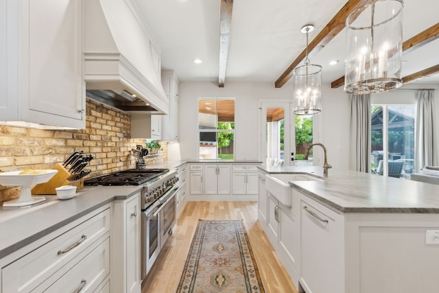 6622 Blue Valley Ln, Dallas, TX 75214 - kitchen featuring custom exhaust hood, white cabinets, a sink, beamed ceiling, and decorative backsplash