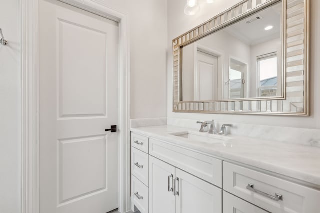6622 Blue Valley Ln, Dallas, TX 75214 - bathroom with visible vents and vanity