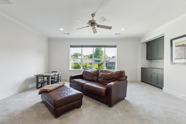 6622 Blue Valley Ln, Dallas, TX 75214 - living area featuring crown molding, visible vents, baseboards, and light colored carpet
