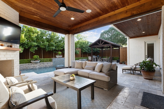 6622 Blue Valley Ln, Dallas, TX 75214 - view of patio featuring a fenced backyard, an outdoor living space, outdoor dining area, and a gazebo