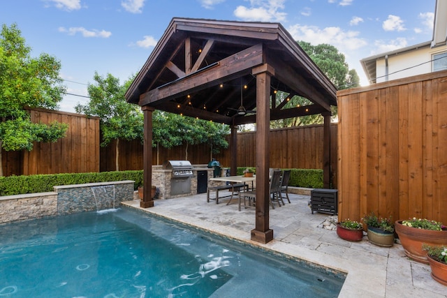 6622 Blue Valley Ln, Dallas, TX 75214 - view of pool with a grill, area for grilling, a gazebo, and a fenced backyard